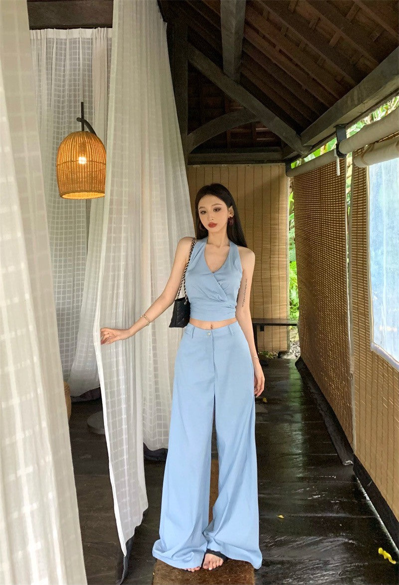 May. 漫步雲海 俐落剪裁修身掛脖長褲套裝 藍