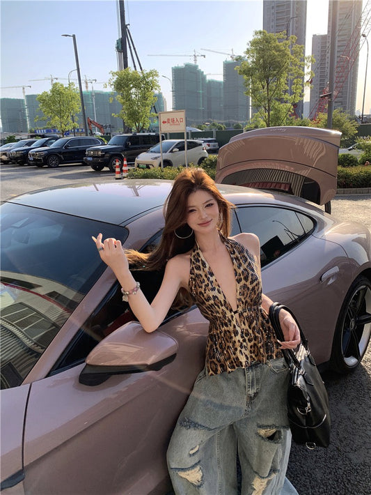 Jun. 曼谷city辣妹花紋亮片露背上衣 不規則刷破闊腿牛仔褲