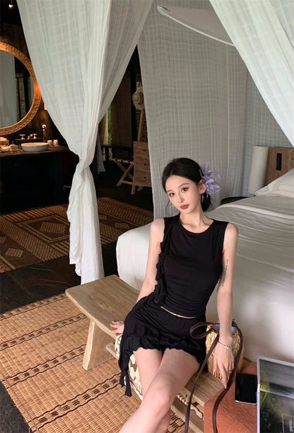 May. 歐美俏皮妞 垂墜荷葉背心半身裙套裝 黑