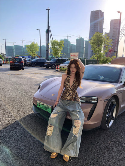 Jun. 曼谷city辣妹花紋亮片露背上衣 不規則刷破闊腿牛仔褲