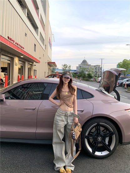 Jun. 牛仔潮 潑染貓鬚水洗淺色彎刀褲 燙鑽Ro風卡其背心