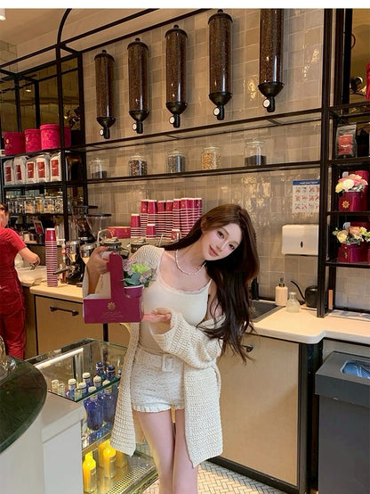 25Oct. 秋日織語慵懶肌理縷空長版針織外套