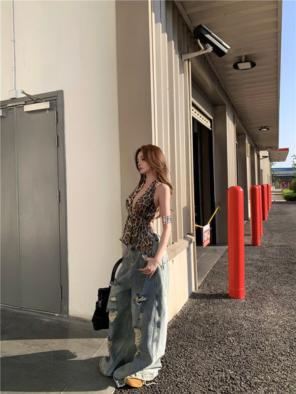 Jun. 曼谷city辣妹花紋亮片露背上衣 不規則刷破闊腿牛仔褲