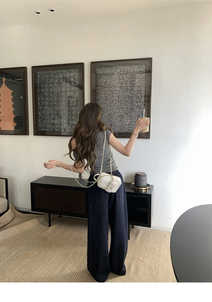 25Oct. 漢南洞時髦歐膩氣質斜肩綁帶上衣 條紋